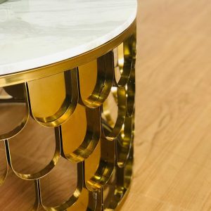 Meja tamu marmer putih dengan rangka stainless gold dekoratif