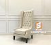 Kursi wingback tinggi warna cream dengan sandaran tufted dan kaki gelap Sandy Jaya Furniture tampak serong